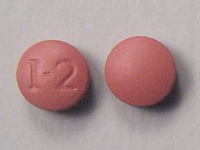 i 2 pill round brown|round ibuprofen.